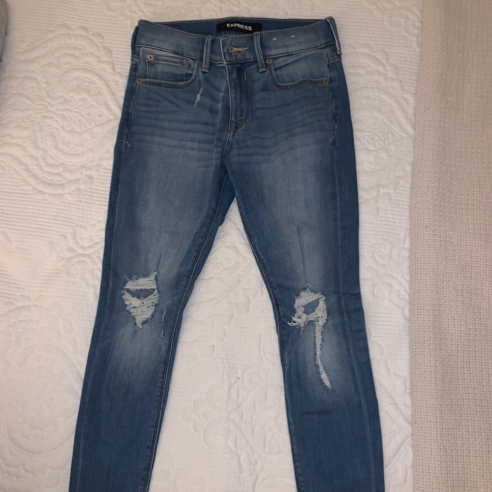 Express mid rise ripped knees jeggings light wash